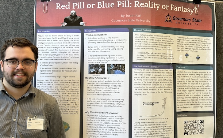 Student in front of poster during Research Day